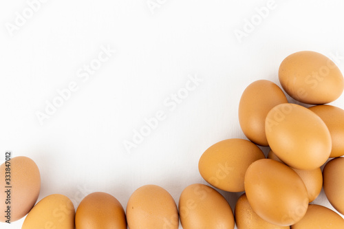 Raw chicken egg isolated on white background, space for text.