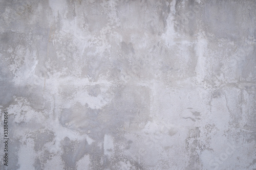 Texture of gray concrete wall surface. Some crack and scratch, suitable for use as a pattern or background image.