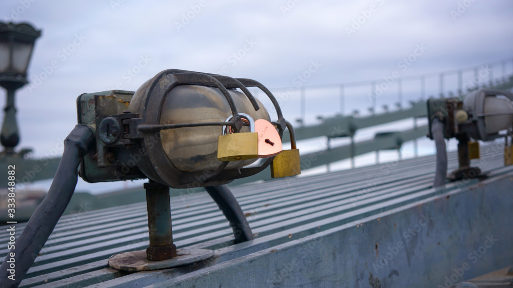 Lamp with padlock mounted on the Budapest Chain Bridge Lamp with padlock mounted on the Budapest Chain Bridge