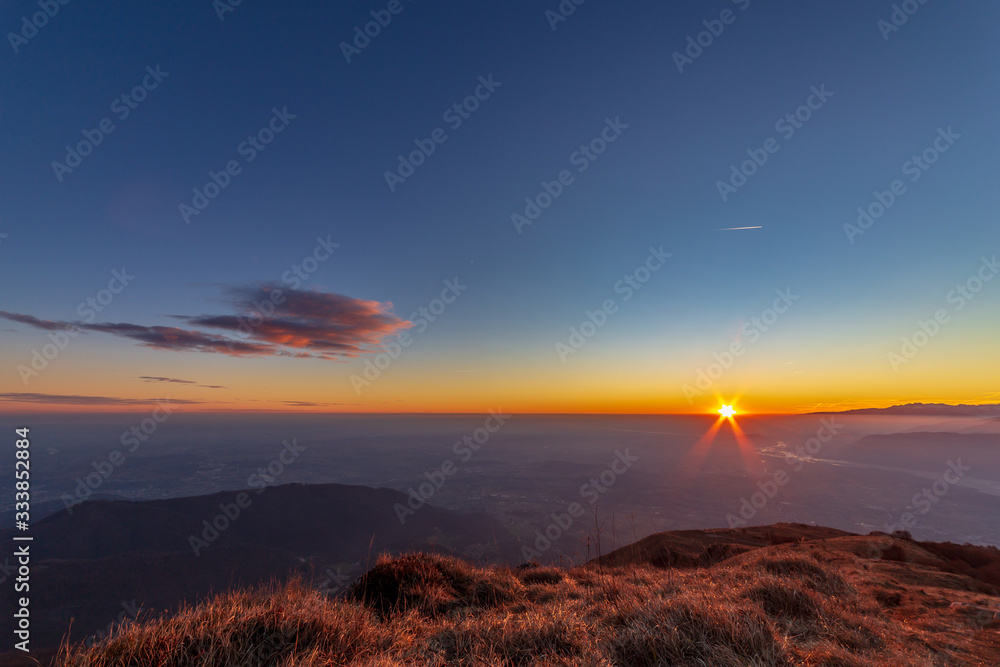 Winter sunset from an alpine peak of Friuli-Venezia Giulia