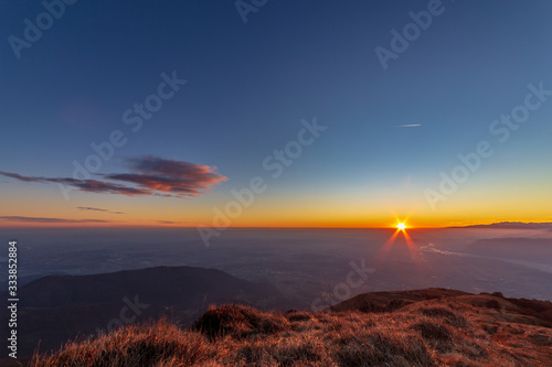Winter sunset from an alpine peak of Friuli-Venezia Giulia © zakaz86