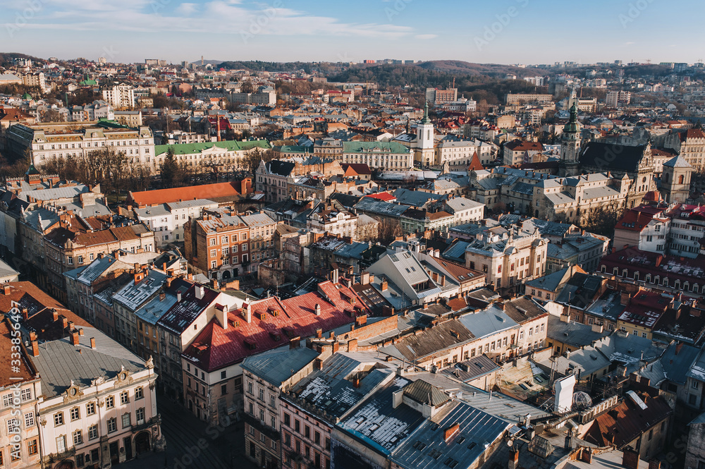 View of the old city from above, from the observation tower of the town hall. Lviv, Ukraine, autumn panorama.