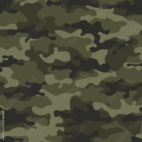 The green camouflage seamless pattern. Military hunting background. Print.