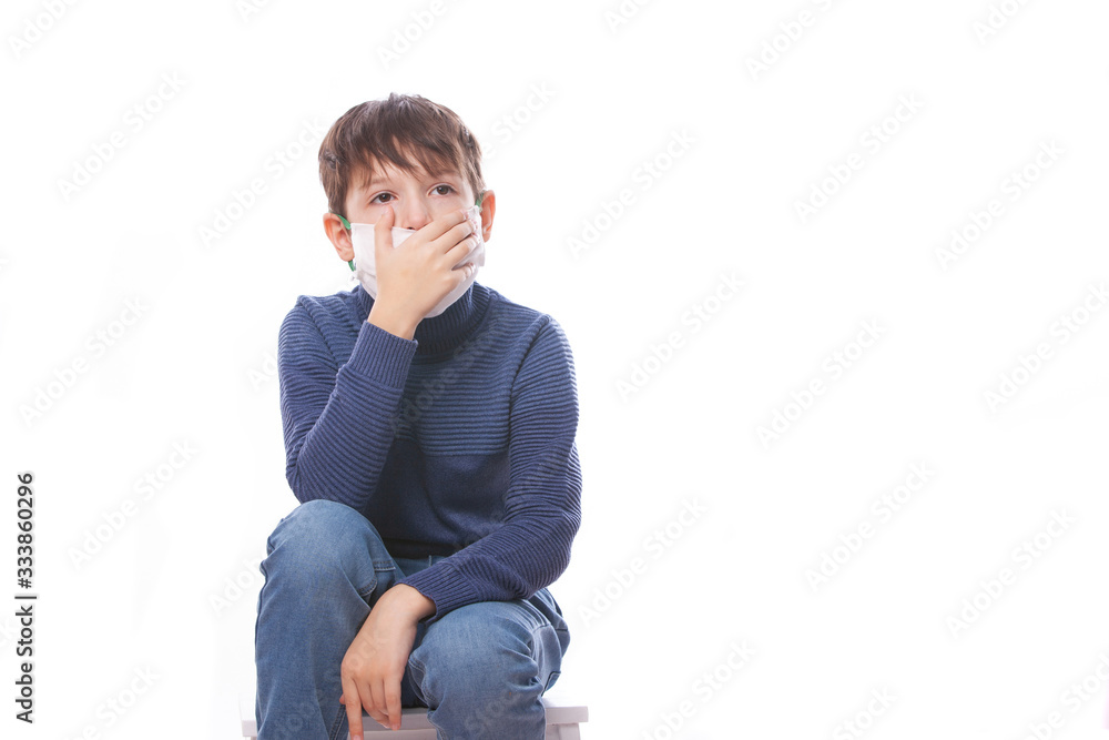 A child in a medical mask during the coronovirus in the world. A child in a medical mask during the coronovirus in the world.