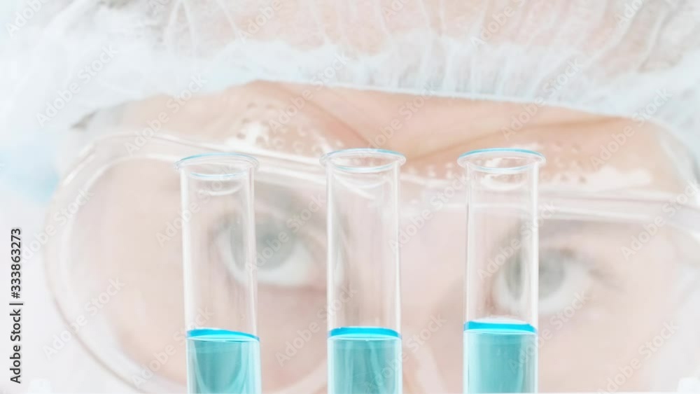 Eyes of a young woman in a chemical laboratory Eyes of a young woman in a chemical laboratory