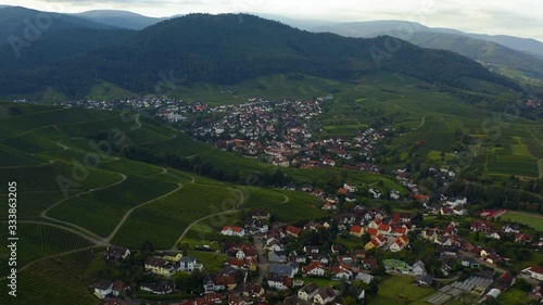 Aerial view around the villages Varnhalt, Steinbach and Neuweier in Germany. Early on a sunny morning in summer.  photo