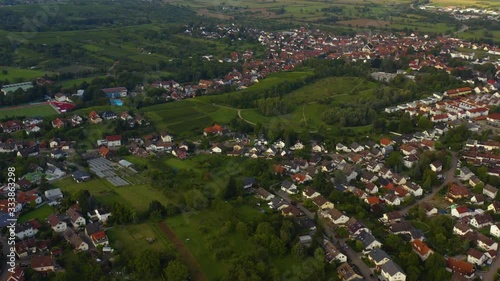 Aerial view around the villages Varnhalt, Steinbach and Neuweier in Germany. Early on a sunny morning in summer.  photo