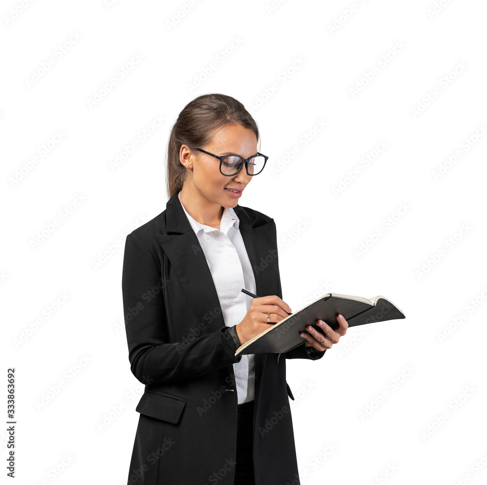 Smiling businesswoman in glasses writing, isolated Smiling businesswoman in glasses writing, isolated