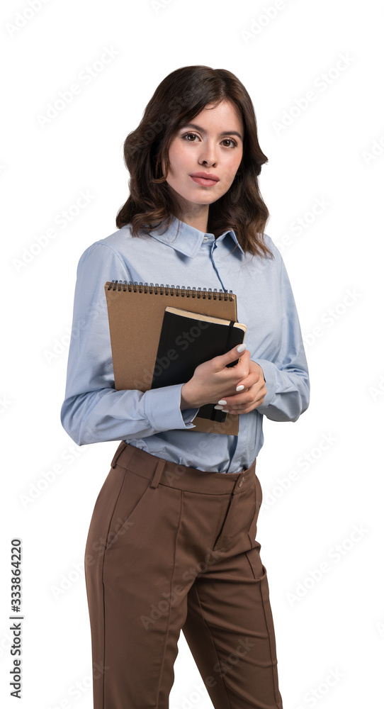 Serious young businesswoman or student notebooks Serious young businesswoman or student notebooks