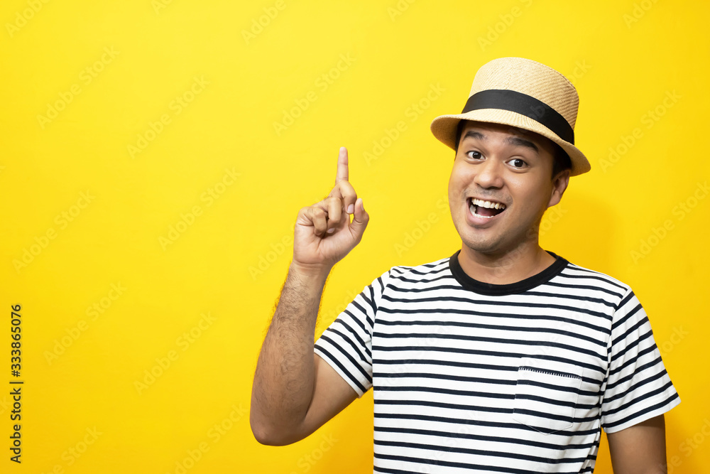 Photo of young excited man happy positive smile yellow background