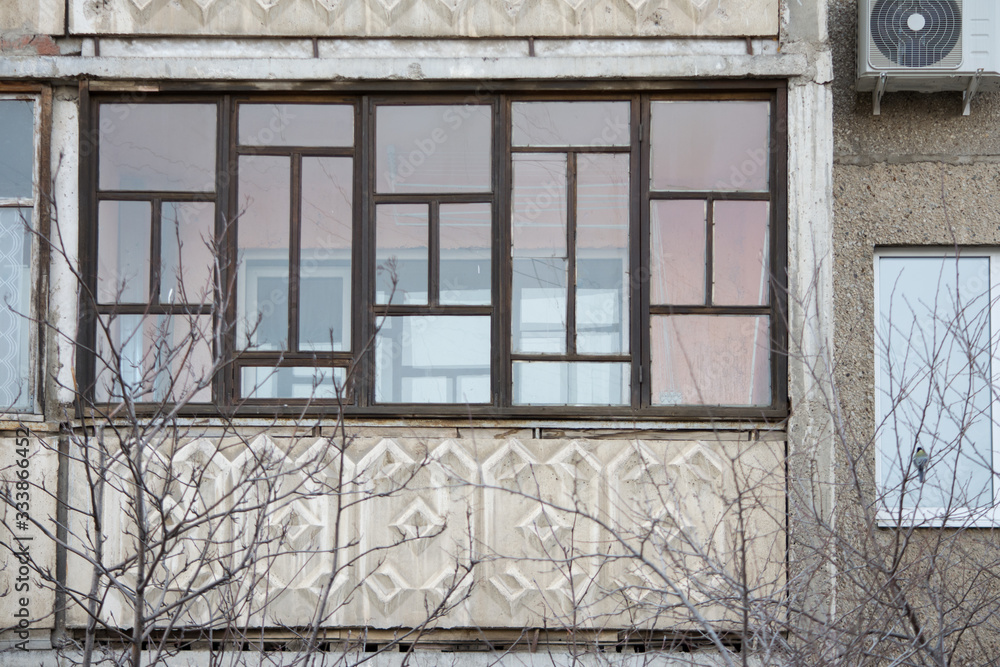 Obraz premium windows prefabricated house ussr Khrushchev glass straight concrete gray russia balcony