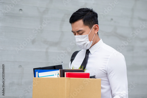 Fototapeta kuchenna Asian man being fired