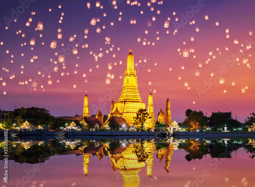 Wat Arun Temple on during sunset. Sunset behind Wat Arun  Bangkok Thailand.