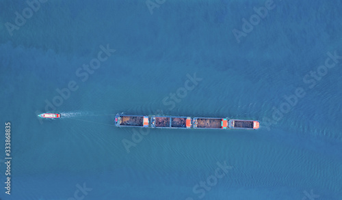 Logistics and transportation of Container Cargo ship and Cargo import/export and business logistics, Shipping , Top view ,Aerial view from drone © jamesboy