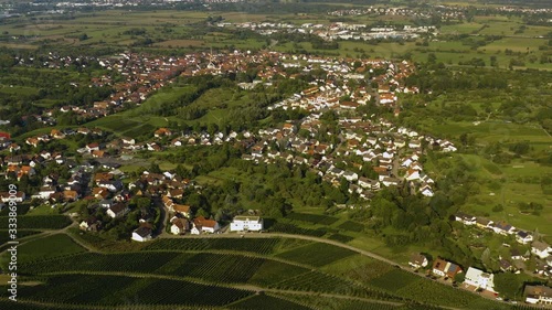 Aerial view around the villages Varnhalt, Steinbach and Neuweier in Germany. Early on a sunny morning in summer.  photo