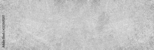 Panoramic grey paint limestone texture background in white light seam home wall paper. Back flat wide concrete stone table floor concept surreal granite quarry stucco surface grunge panorama landscape