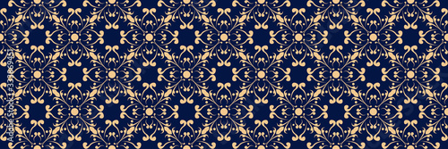 Floral print. Golden pattern on dark blue seamless background