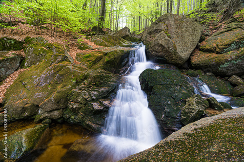 Fototapeta Naklejka Na Ścianę i Meble -  Waterfall on a creek in the mountains