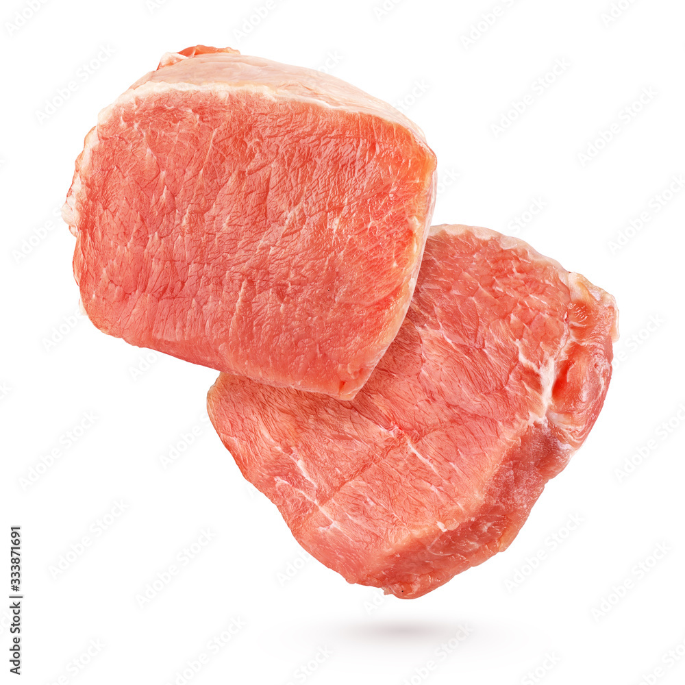 Slices of pork loin meat on a white background Slices of pork loin meat on a white background