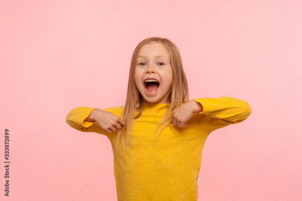 Wow, this is me! Amazed cute little girl pointing herself and shouting in surprise, child happy proud and shocked by her great success, unbelievable winning. studio shot isolated on pink background Wow, this is me! Amazed cute little girl pointing herself and shouting in surprise, child happy proud and shocked by her great success, unbelievable winning. studio shot isolated on pink background