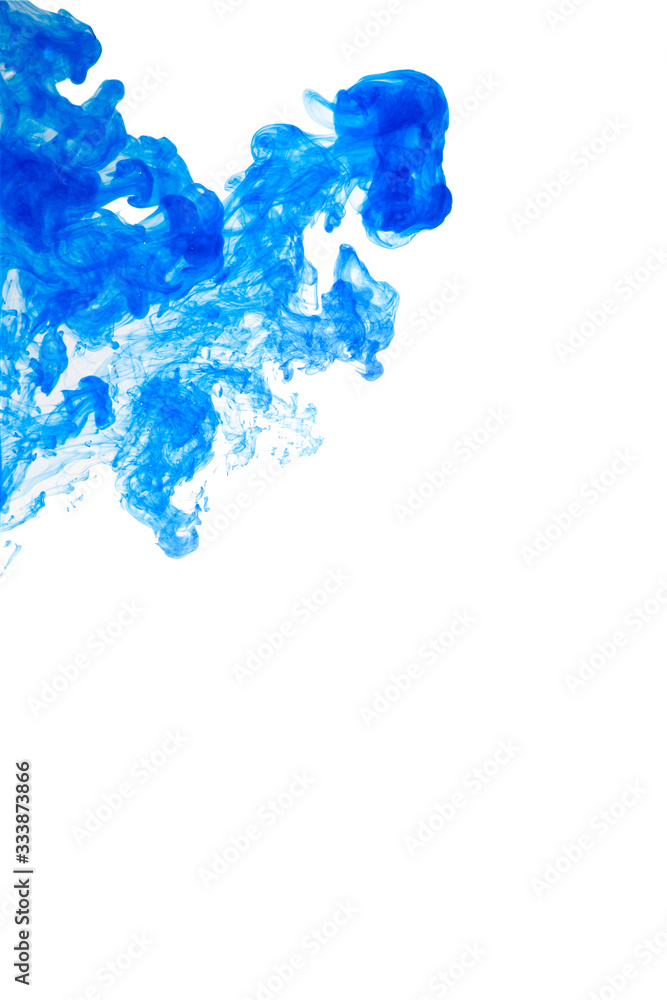 Bright blue ink in water. Abstract patterns of paints in water. Bright color background.