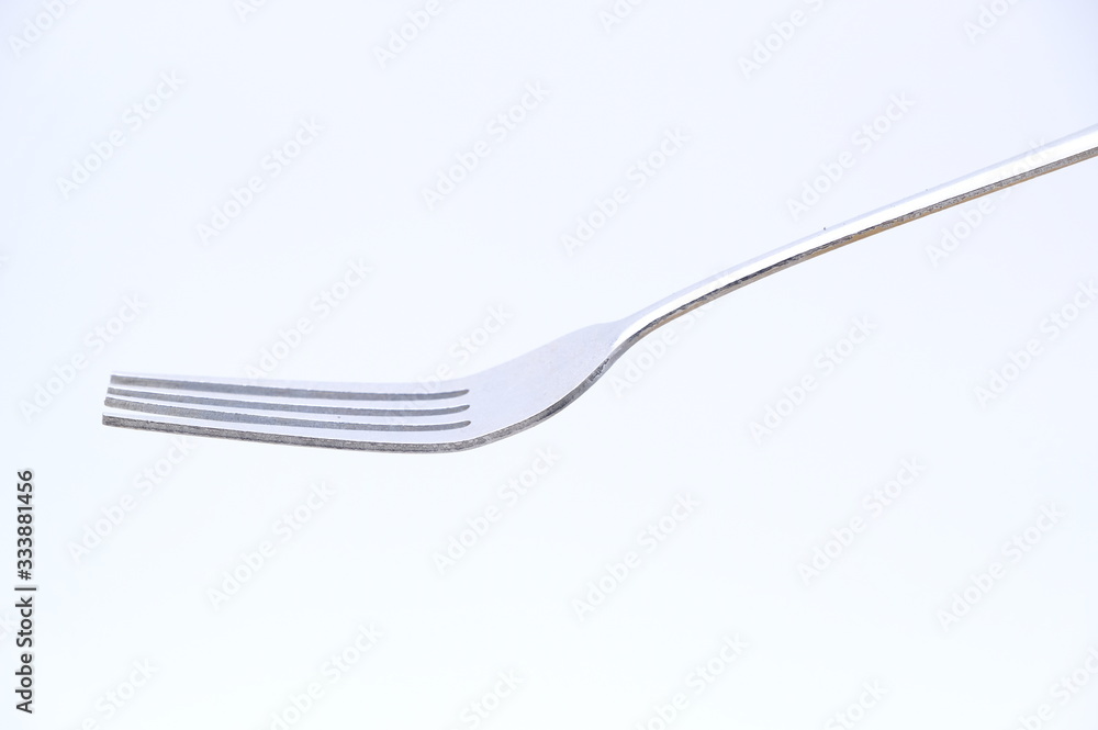 fork and spoon isolated on white background