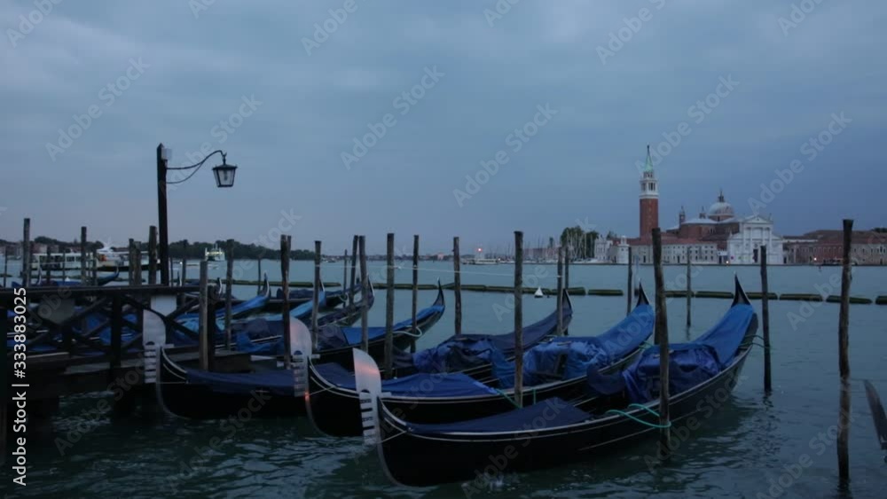 Gondolas floating in Grand Canal in night, Venice, Italy Gondolas floating in Grand Canal in night, Venice, Italy