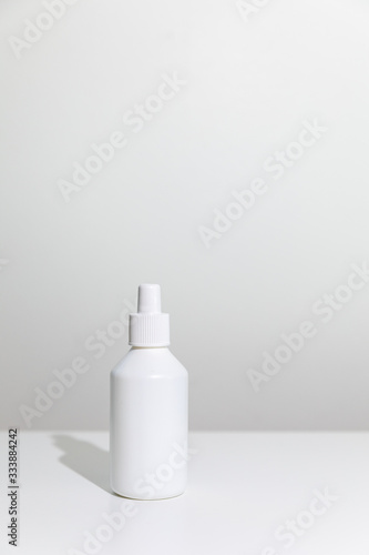Medical white bottle isolated on white background