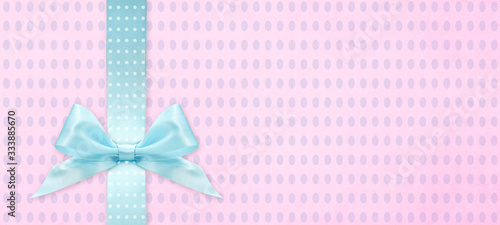 happy easter gift card with blue ribbon bow Isolated on pink texture background with copy space