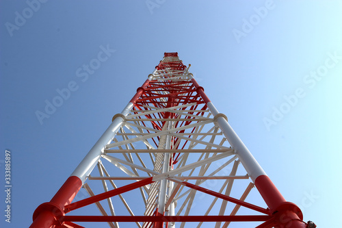 The telephone tower is white and red 2.