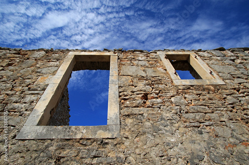 Windows in Humac, ghost village, abandoned village on Hvar island, Croatia