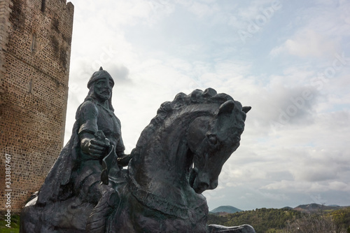 Statue of Ibn Qasi warrior conqueror on a horse in Mertola castle, Portugal photo