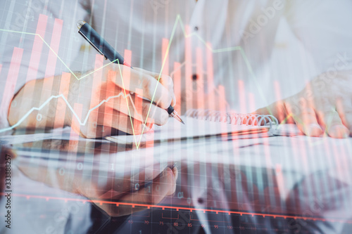 Wallpaper Mural Multi exposure of man planing investment with stock market forex chart. Torontodigital.ca