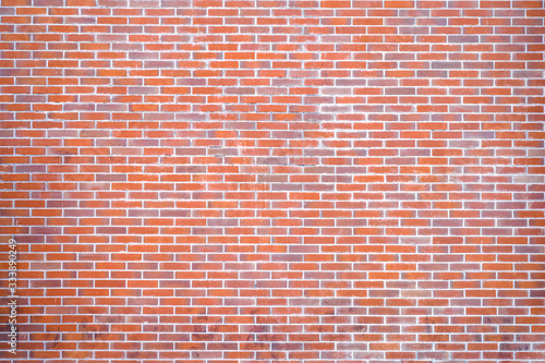 Orange tone Brick wall material construction architecture interior graphic web design background idea.