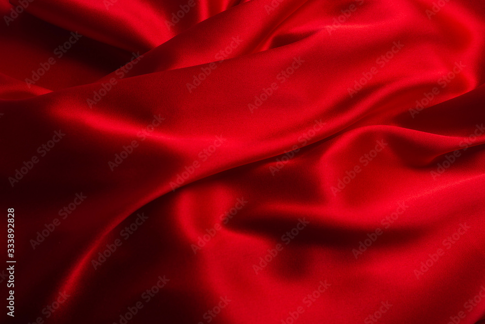 Red silk or satin luxury fabric texture can use as abstract background. Red silk or satin luxury fabric texture can use as abstract background.