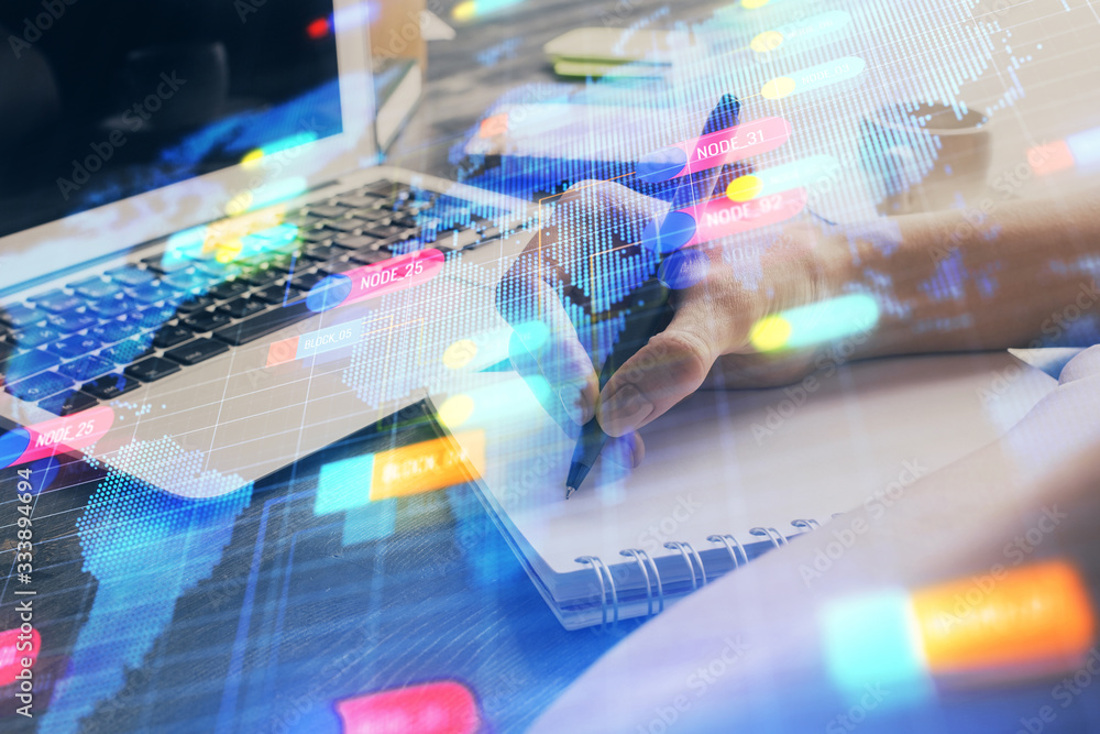 Multi exposure of writing hands on background with data solution hologram. Technology concept. Multi exposure of writing hands on background with data solution hologram. Technology concept.