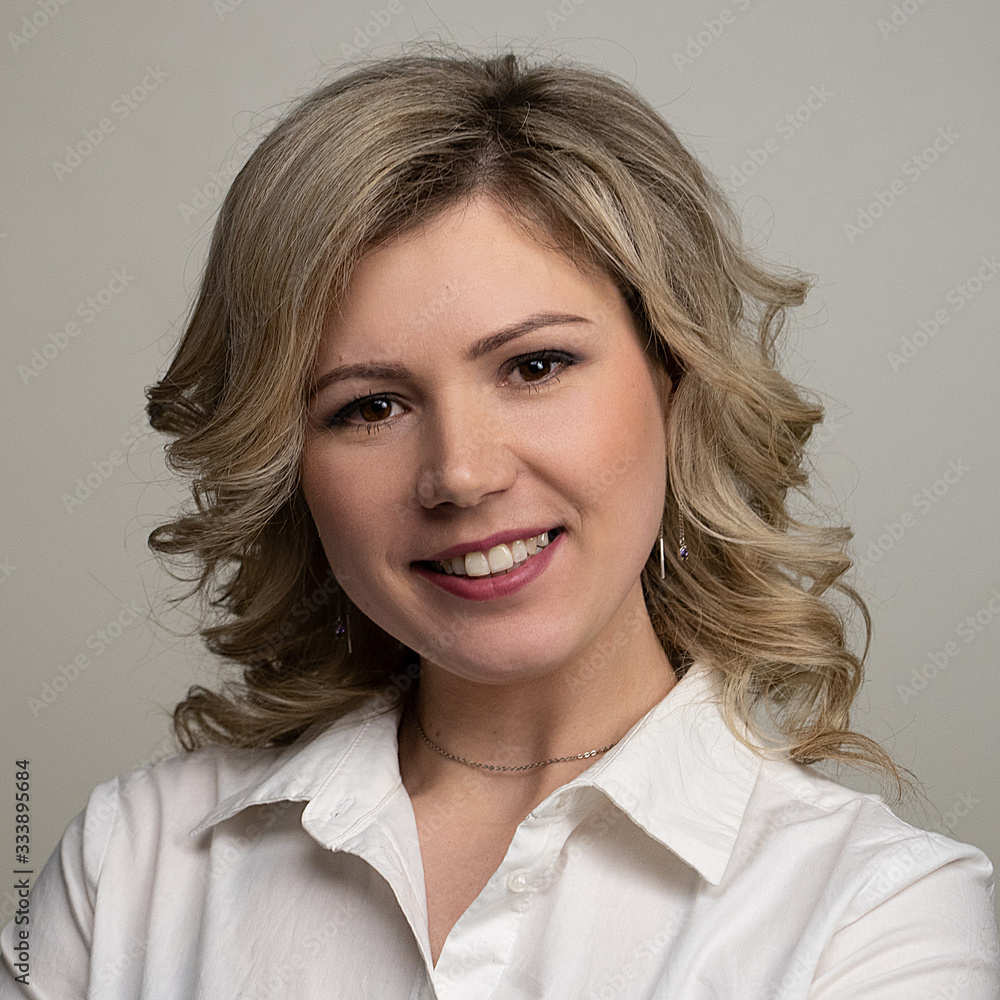 woman 30 years old with blond hair posing on a white background