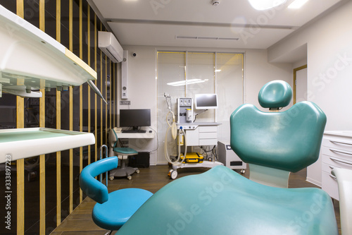 View on children dentist chair in modern well equipped room