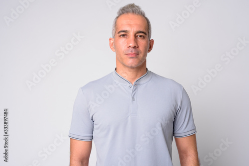 Portrait of handsome Persian man with gray hair © Ranta Images