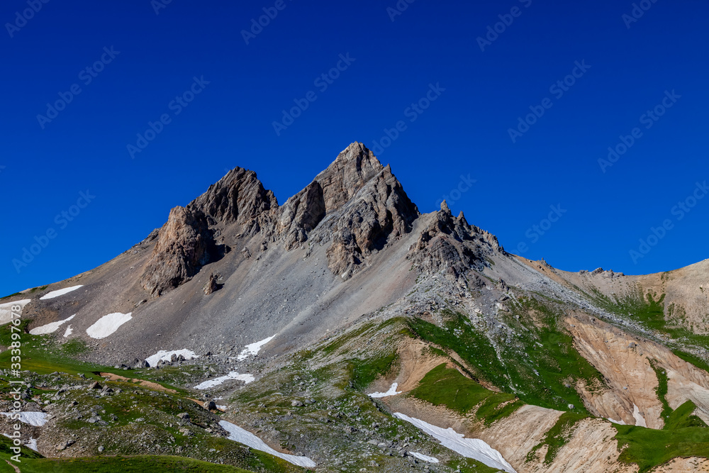 View of Tete du Chien peak located in Massif des Cerces on Valee Etroite in Hautes Alpes in France.
