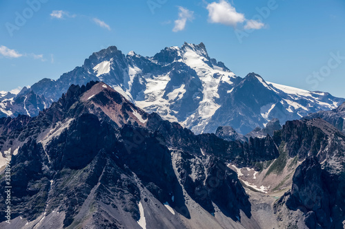 High altitude landscape in Alps with snowcapped peaks seen from Etroite Valley in Massif des Cerces in Hautes Alps in France. © Provisualstock.com