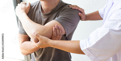 Cuadro en lienzo Professional therapists are stretching muscles, patients with abnormal muscular symptoms, physical rehabilitation therapies and treatment of physiological disorders by physiotherapists concept