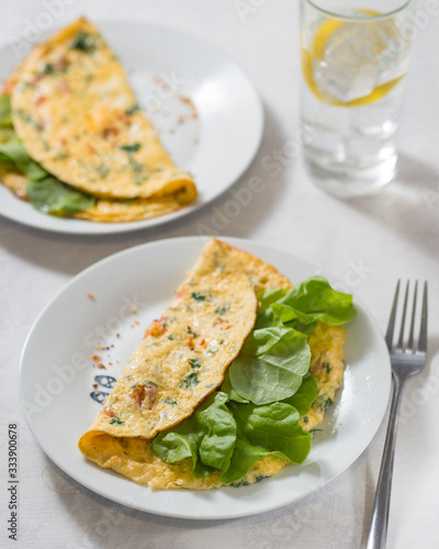 omelet with tomatoes and herbs Breakfast snack