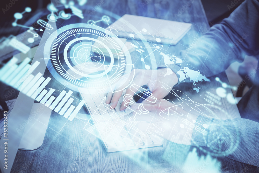 Double exposure of businessman working on laptop on background. International business hologram in front. Concept of success. Double exposure of businessman working on laptop on background. International business hologram in front. Concept of success.