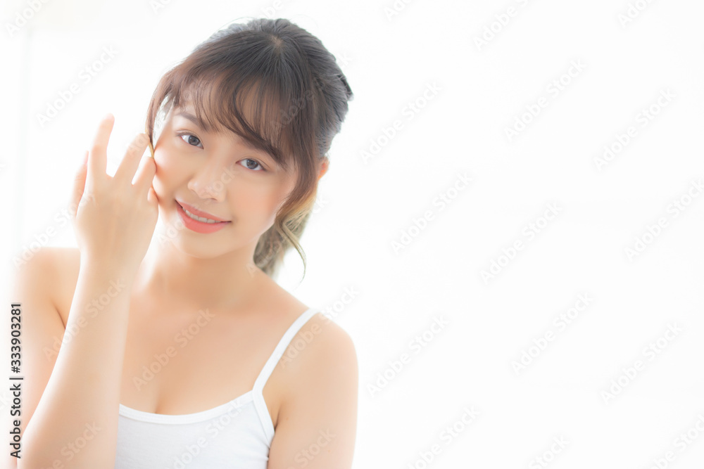 Portrait of beautiful young asian woman smile healthy and wellness at the bedroom, beauty asia girl skin care touch eye makeup and cosmetic with happy with fresh, lifestyle and relax concept. Portrait of beautiful young asian woman smile healthy and wellness at the bedroom, beauty asia girl skin care touch eye makeup and cosmetic with happy with fresh, lifestyle and relax concept.