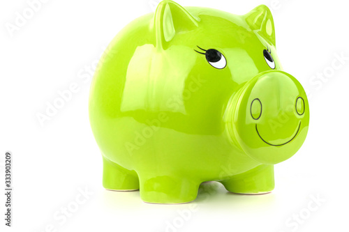 Green, green piggy bank isolated on a white background. Budget saving concept.