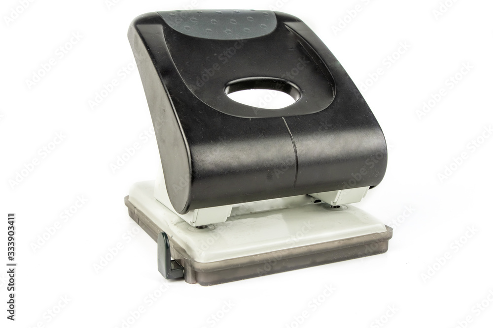 Black hole punch isolated on a white background. Office concept. Black hole punch isolated on a white background. Office concept.