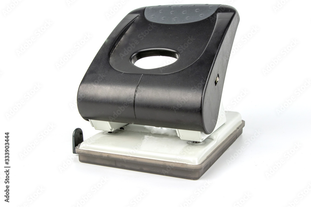Black hole punch isolated on a white background. Office concept. Black hole punch isolated on a white background. Office concept.
