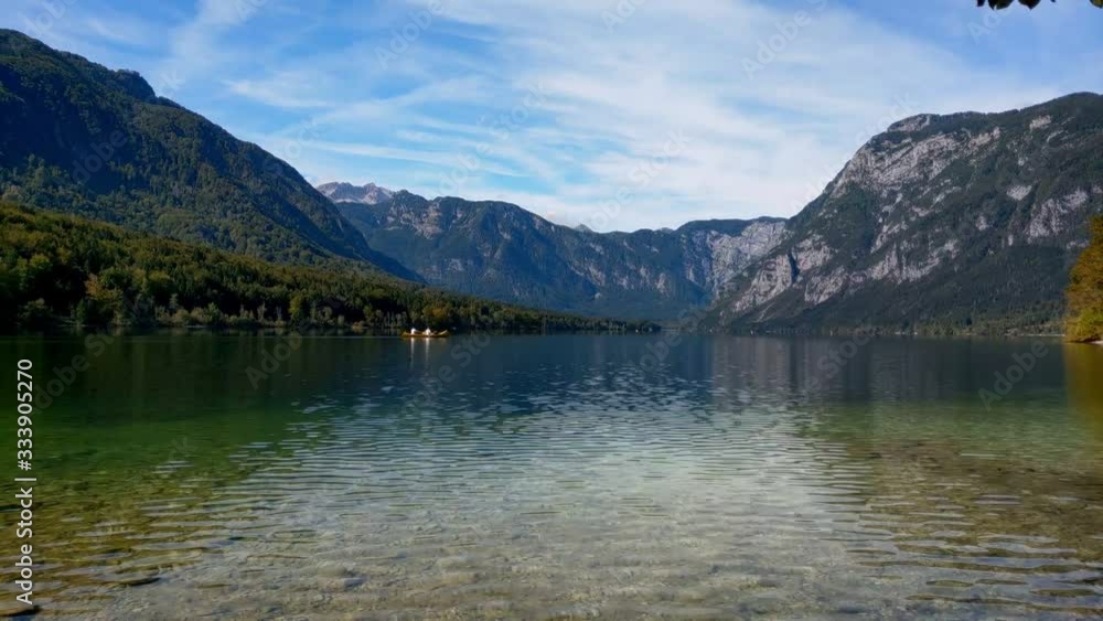 Scenic Lake Bohinj in the Slovenia. Bohinj Valley of the Julian Alps. Upper Carniola Region and Part of Triglav National Park Scenic Lake Bohinj in the Slovenia. Bohinj Valley of the Julian Alps. Upper Carniola Region and Part of Triglav National Park