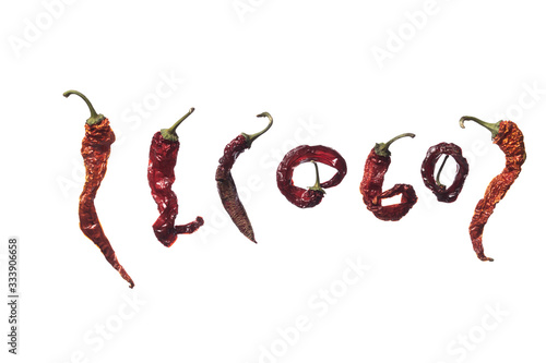 Dry chili peppers on a white background